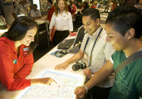 Visitors being assisted at the Melbourne Visitor Centre 