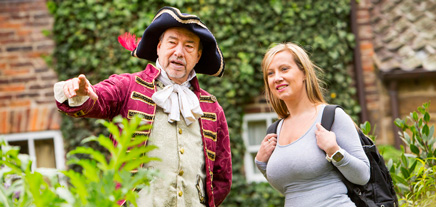 Tour guide at Cooks Cottage.